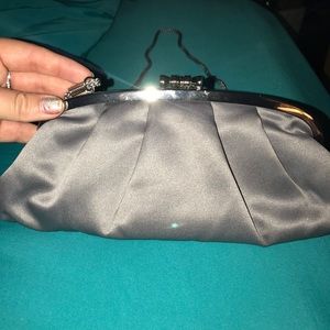 Silver clutch with strap